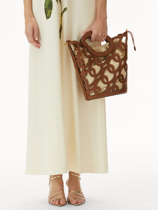 Cognac Oscar Chain-Link Leather Tote, formed by interlocking 'O' emblems and a large 'O' forms the top handle, with a removable interior pouch. Front View