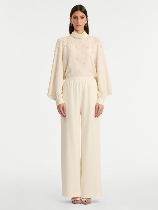 Ivory Silk Georgette Wide Leg Pant with an elastic waistband. Front View.