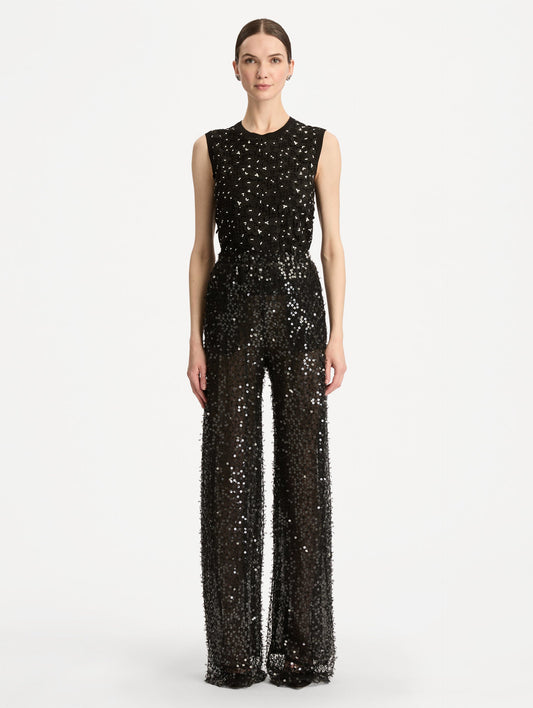 Black Floating Sequin Pant with high waist and wide leg silhouette. Front View.