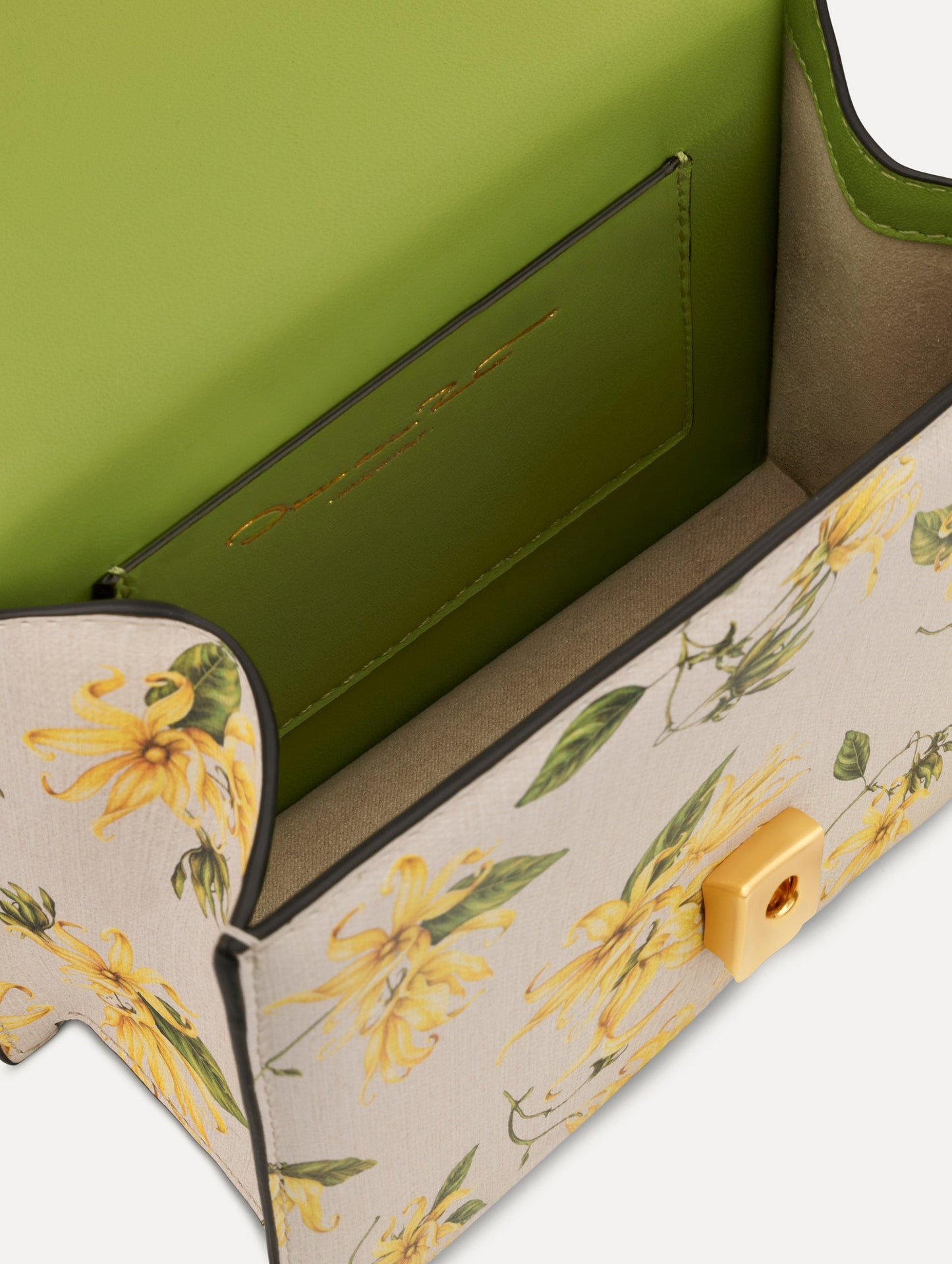 The Ylang Ylang Printed Mini TRO Bag in Yellow. Detail View.