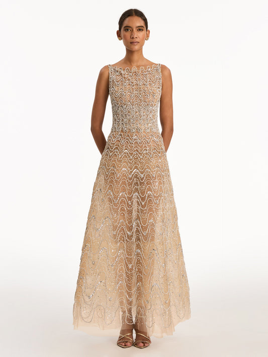Beige Crystal Wave Embroidered Dress with strapless wave neckline and sheer metallic finish. Front View.