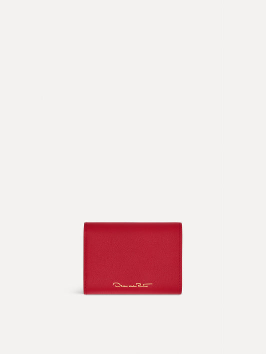 Red Tri-Fold Wallet featuring a gold O motif clasp. Back View.