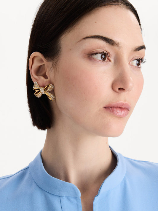 The Crystal Pavé Bow Earrings in Crystal. Front view.