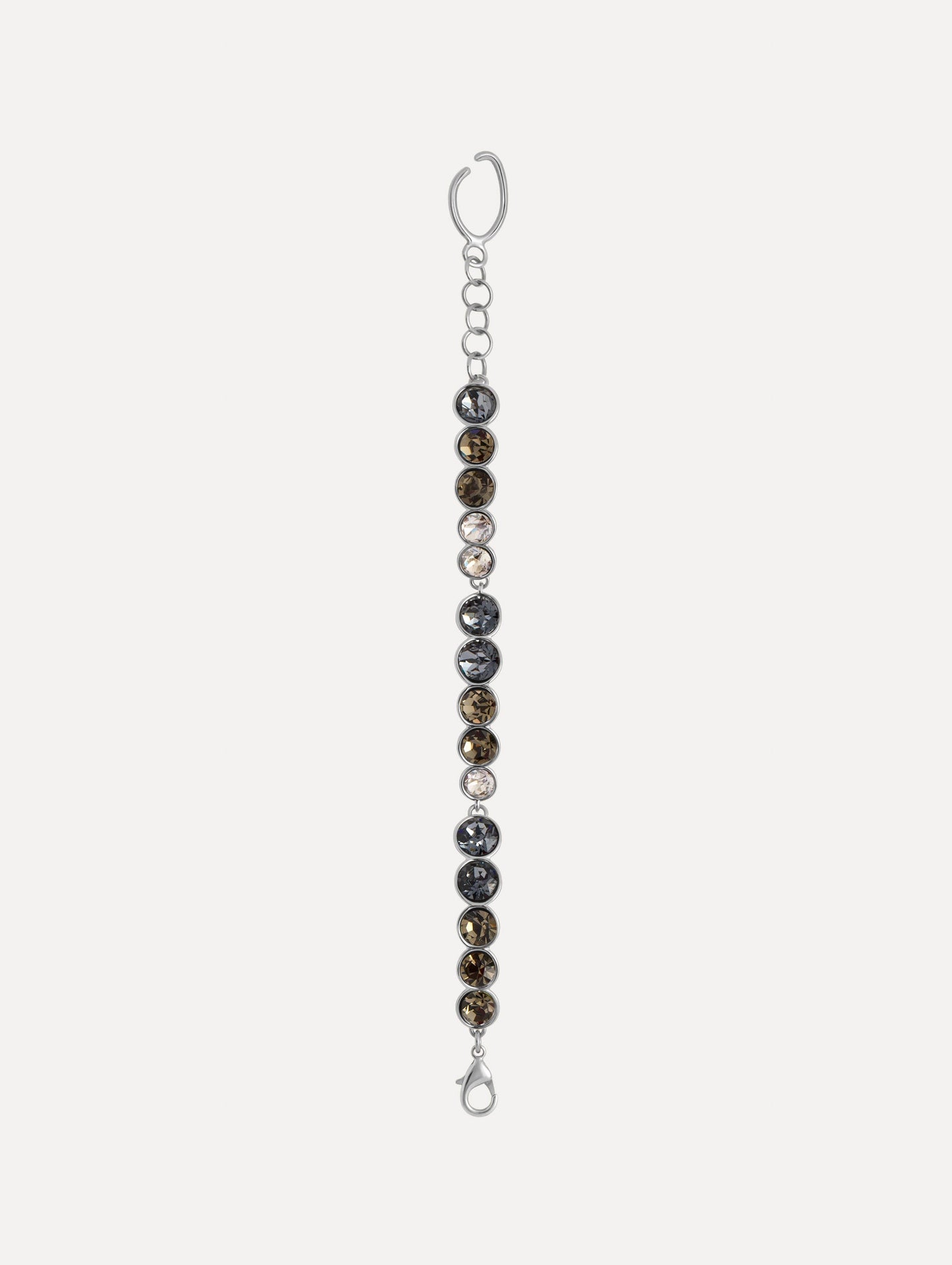 Gradient Rhinestone Strand Bracelet featuring a row of round, clear and smoky grey stones and an open circular clasp. Front View.