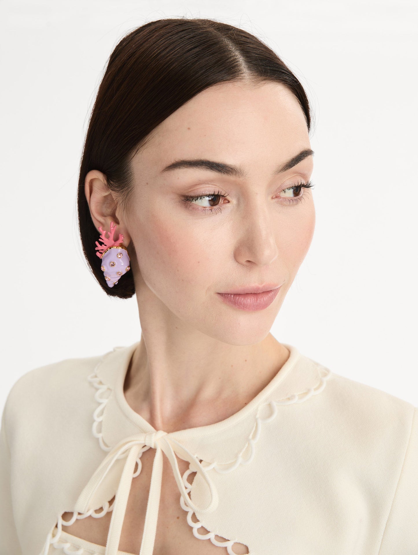 Lavender Seashell and Coral Earrings with pink crystal accents and bold red coral detailing. Side View.