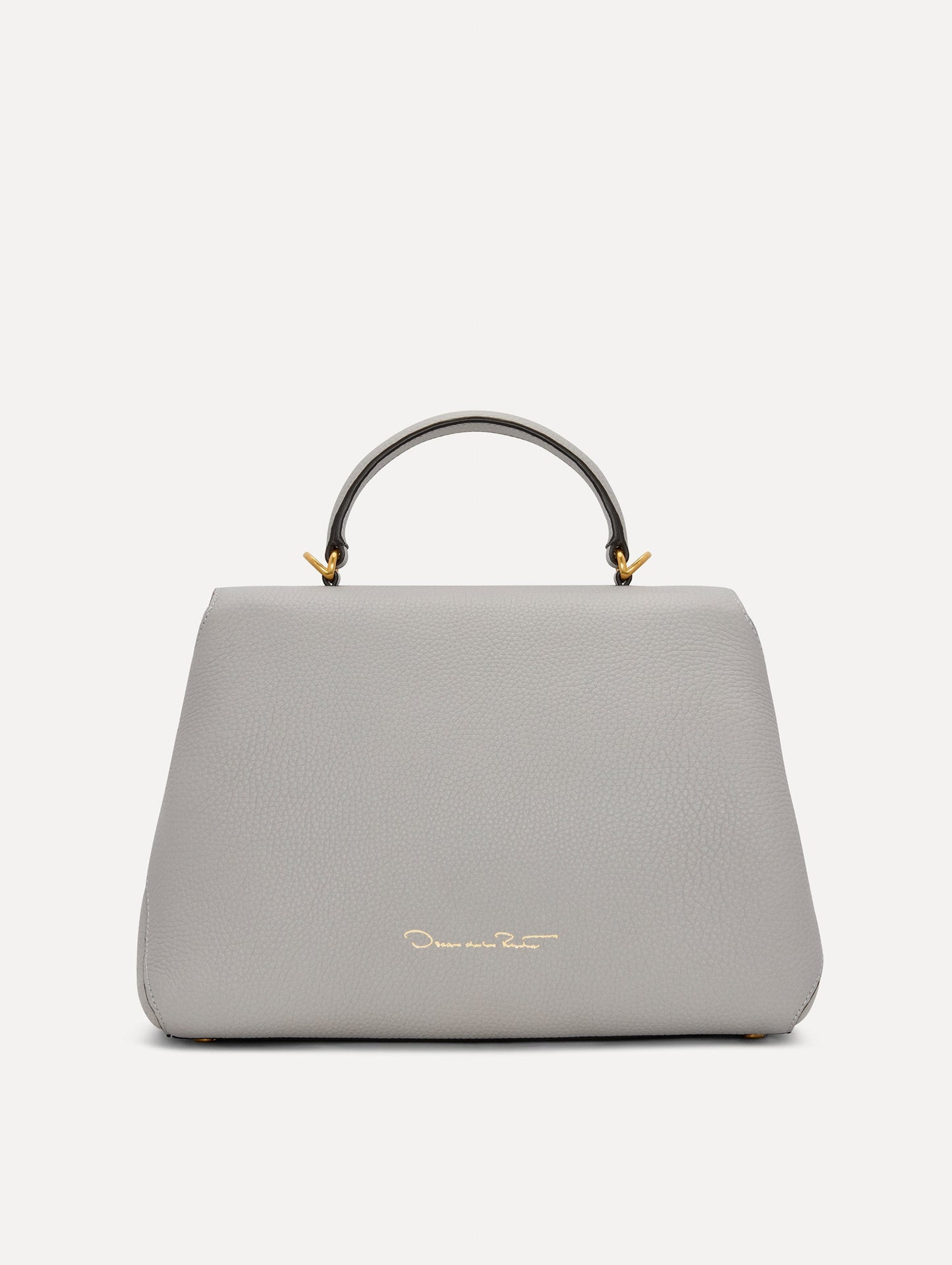 The Poppy Leather Handbag in Grey with O logo Tag around the Top Handle, and Detachable Shoulder Strap. Back View