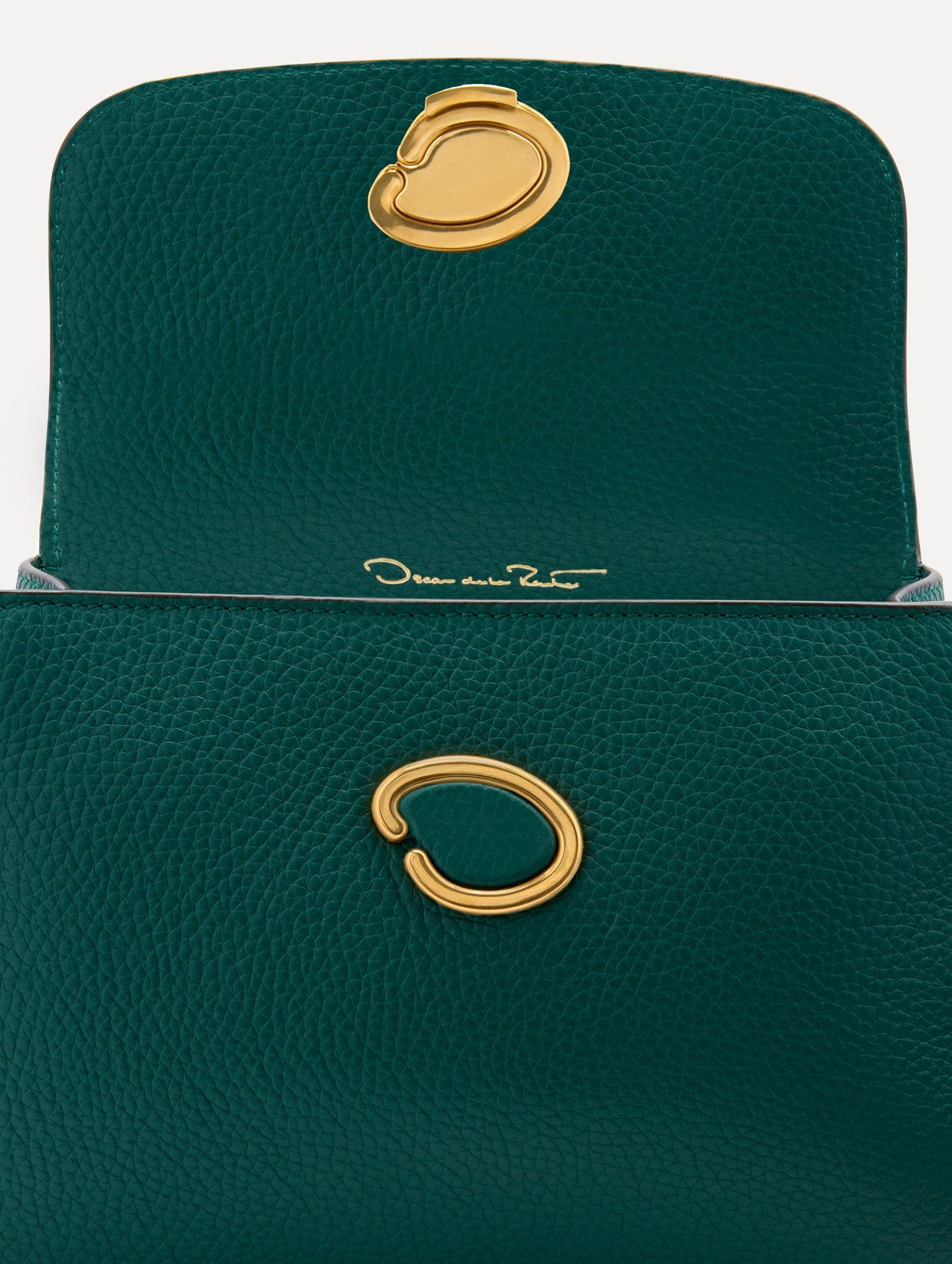 The Mini Poppy in Green with O closure Clasp. Zoom View