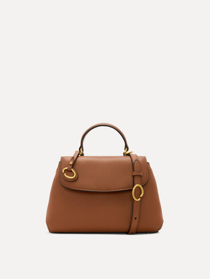The Mini Poppy Leather Handbag in Brown with O tag around the Top handle and Detachable Shoulder Strap Front View
