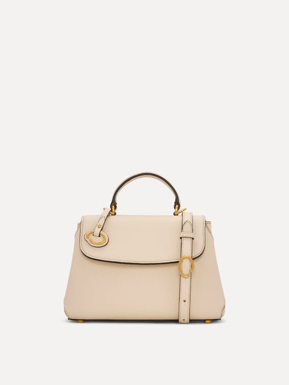 The Mini Poppy Leather Handbag in Ivory with O tag around the Top handle and Detachable Shoulder Strap Front View
