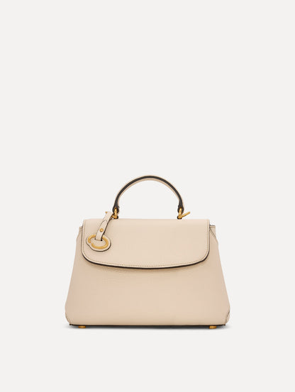 The Mini Poppy Leather Handbag in Ivory with O tag around the Top handle Front View