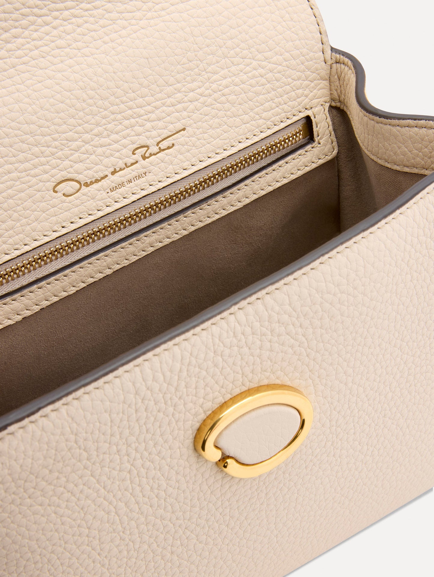 Inside The Mini Poppy Leather Handbag in Ivory with Magnetic O at Closure Zoom View
