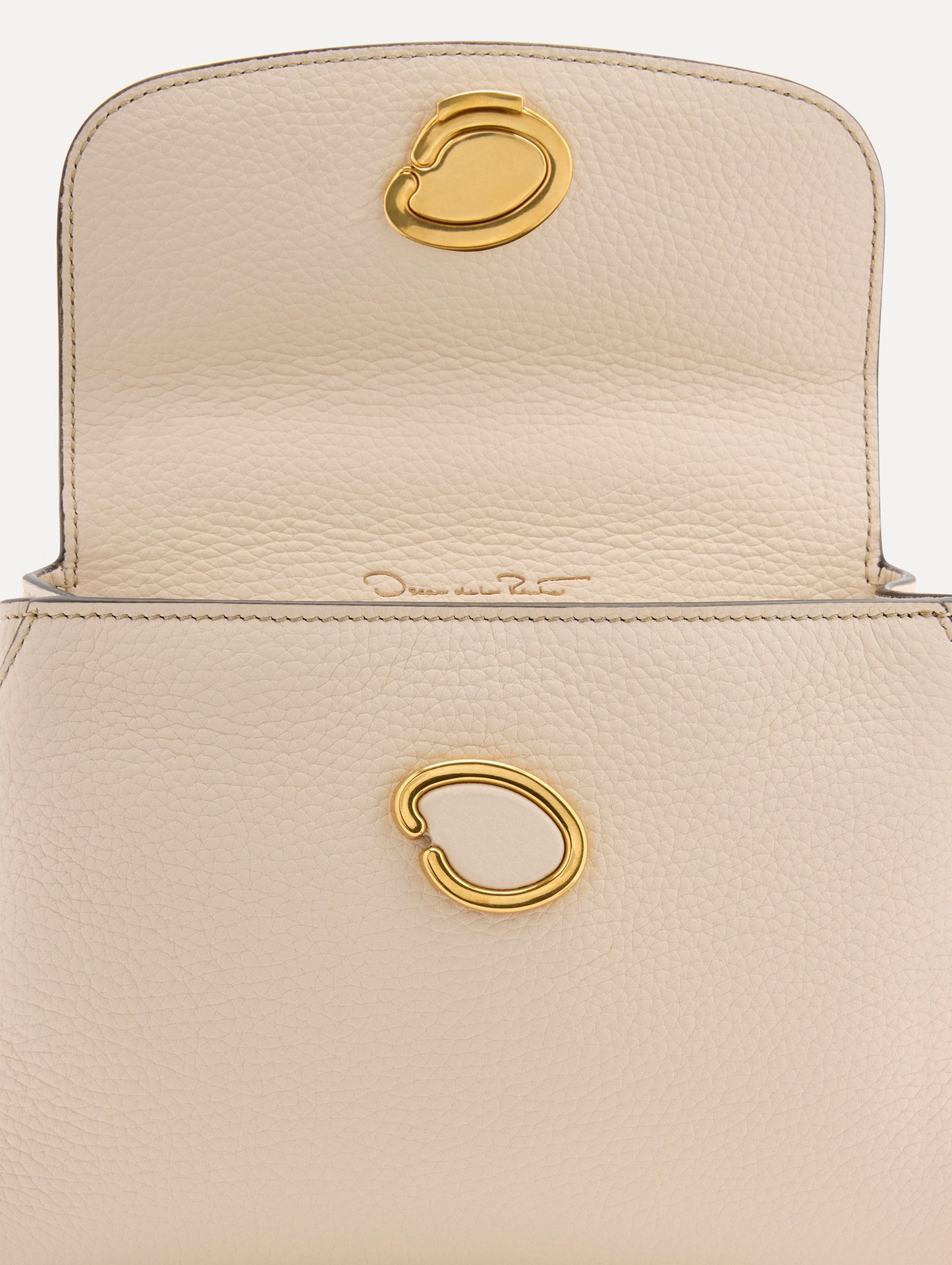 Inside The Mini Poppy Leather Handbag in Ivory with Magnetic O at Closure Zoom View
