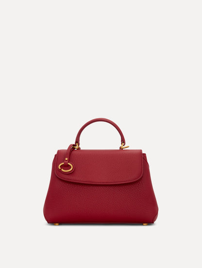 The Mini Poppy Leather Handbag in Red with O tag around the Top handle Front View