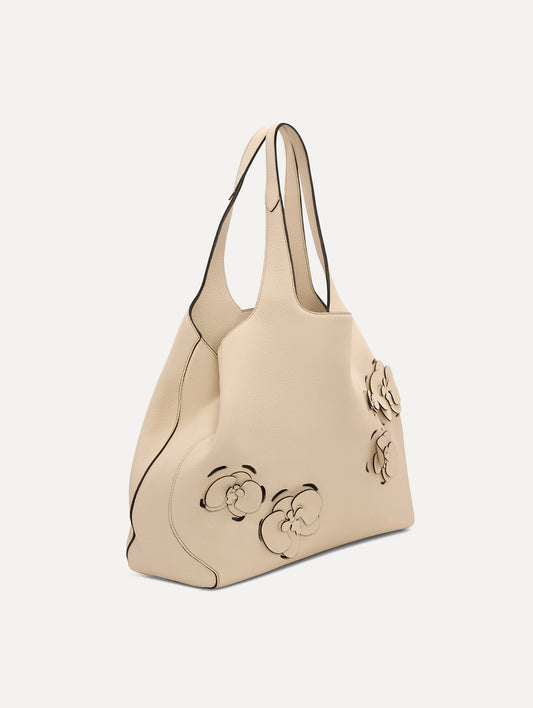 The Laser-Cut Orchid Topaz Tote in Ivory Front View