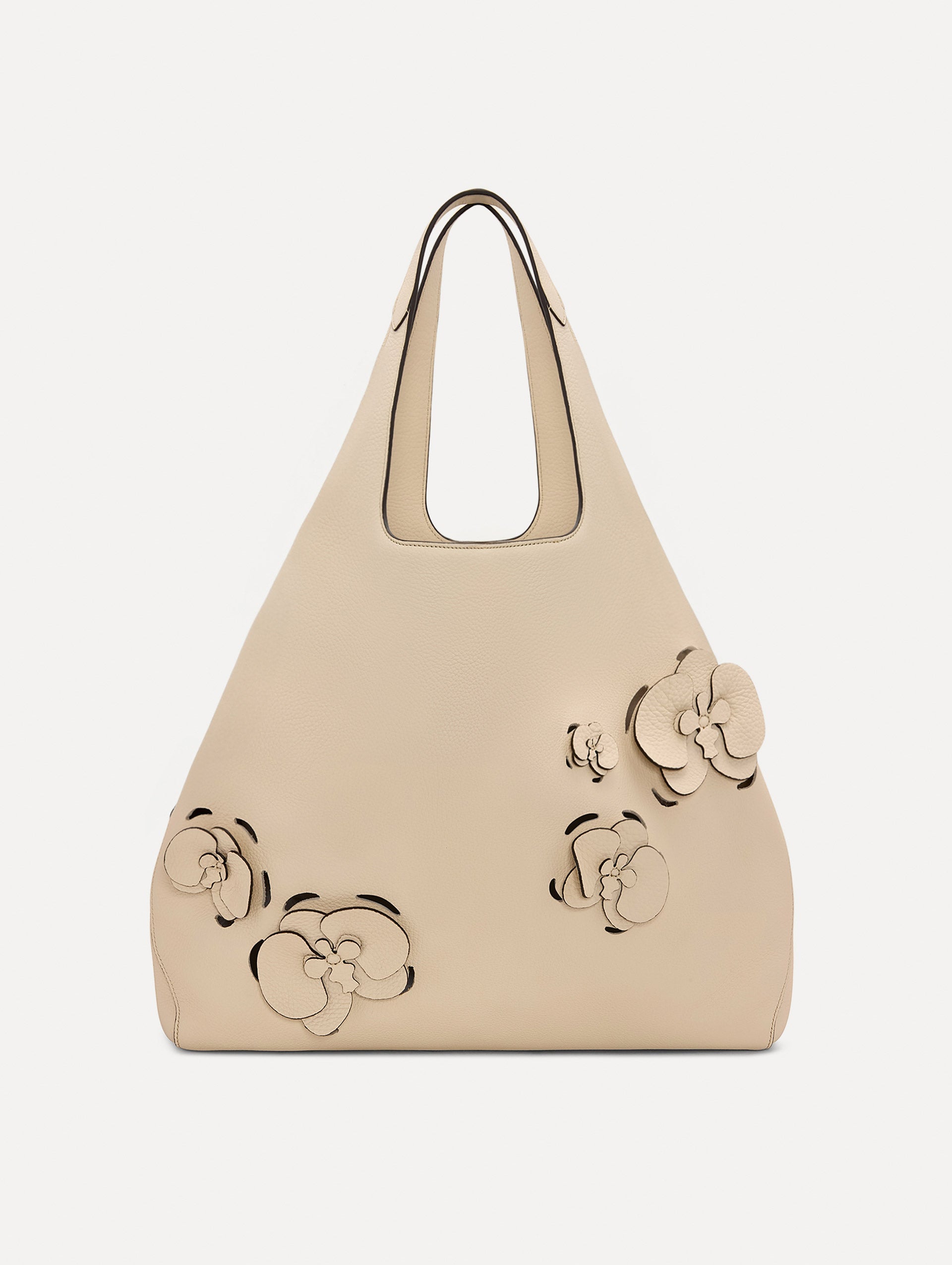 The Laser-Cut Orchid Topaz Tote in Ivory Front View