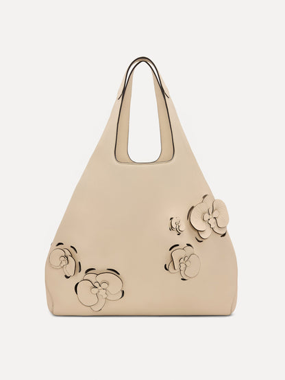 The Laser-Cut Orchid Topaz Tote in Ivory Front View