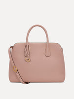 The Ivy Leather Handbag in Blush with O logo tag around Top Handle and Detachable Shoulder Strap Front View