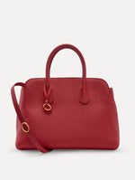 The Ivy bag in Scarlet, front view with shoulder strap showing.