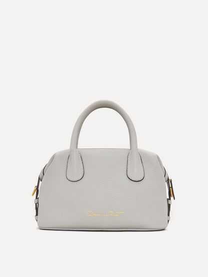 The Mini Dahlia Leather Handbag in Pearl Grey with Detachable Shoulder Strap and O logo tag around the Top Handle. Back View
