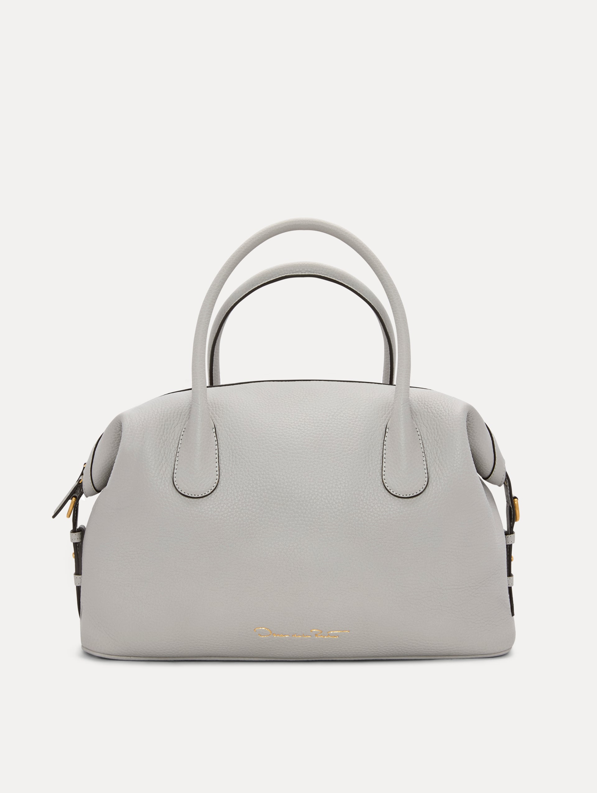 The Dahlia Leather Handbag in Pearl Grey with detachable Shoulder Strap and O logo tag Around the top handle. Back View