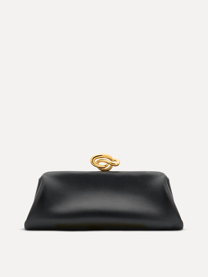 Black clutch with gold 'O' emblem on the clasp.