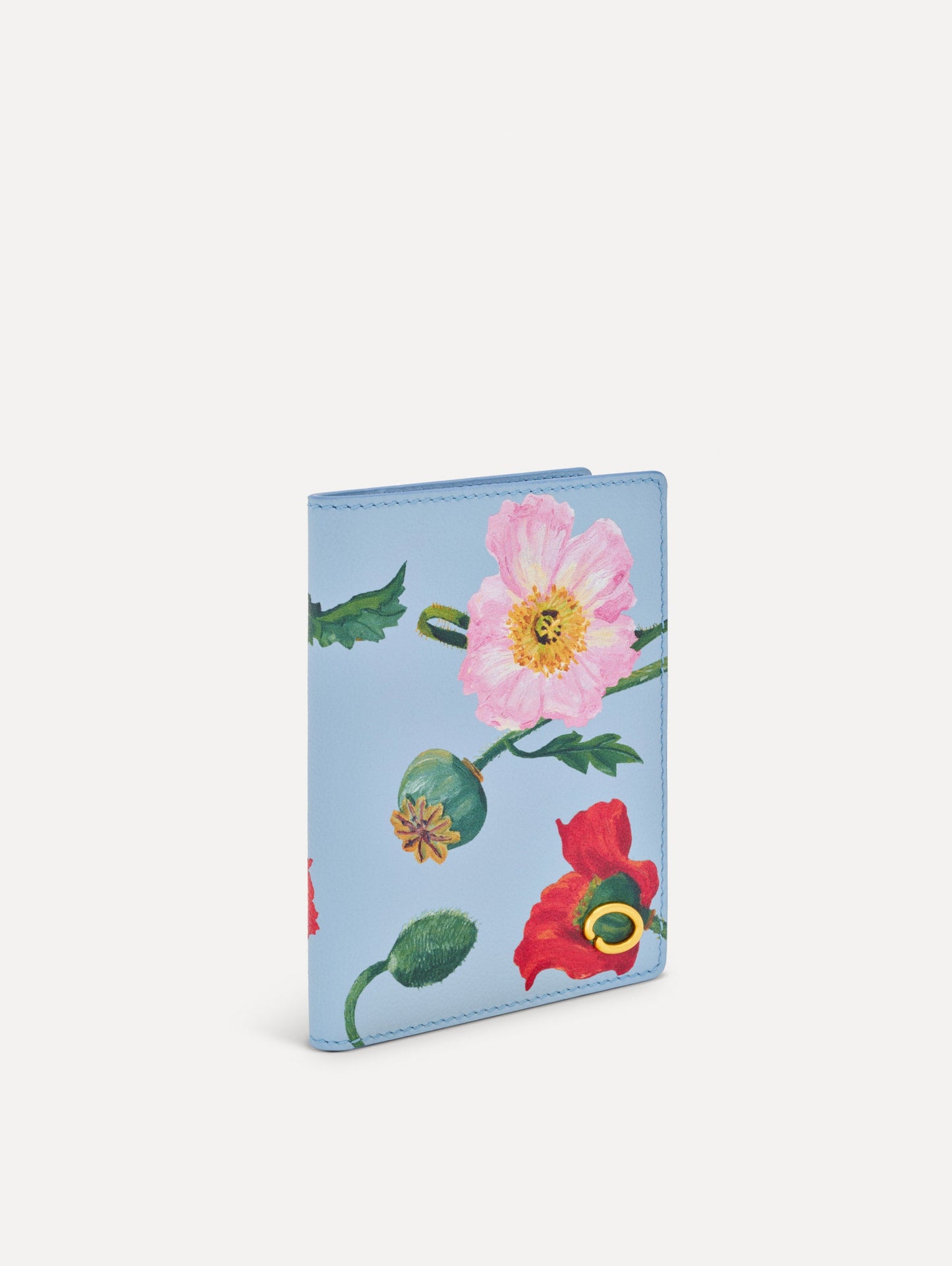Blue Poppy-Printed Passport Cover with pink and red poppy floral motifs. Side view.