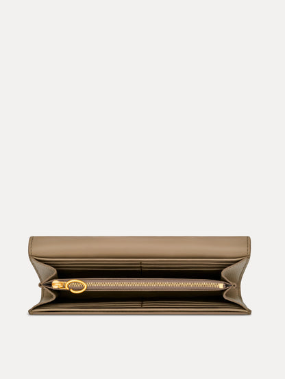 Beige Lily of the Valley-Printed Continental Wallet with green and white floral motifs and a gold O motif Clasp. Zoom View.