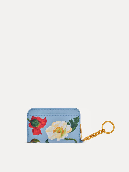 Blue Poppy Printed Zip Card case with white and red floral motifs and gold hardware. Front View.