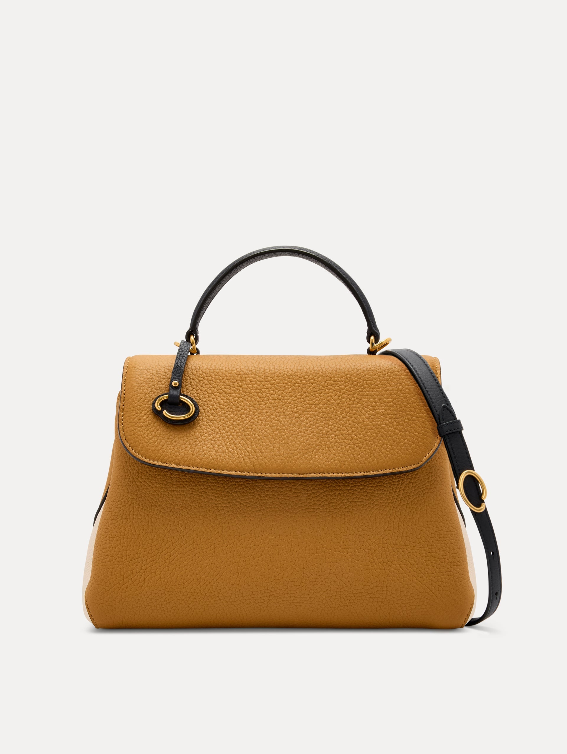 The Poppy Handbag in Honey with Black Top Handle and removeable shoulder strap. Adorned with Oscar de la Renta's signature O at the ornamental bag tag. Front View