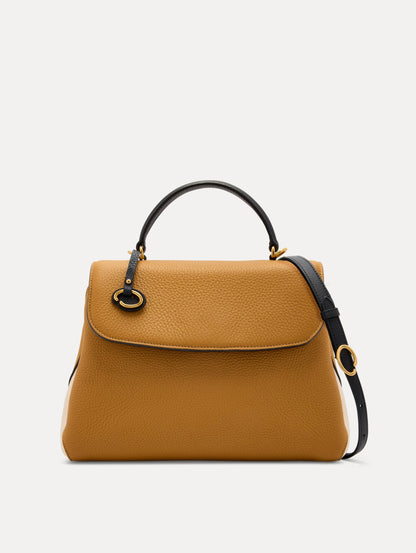 The Poppy Handbag in Honey with Black Top Handle and removeable shoulder strap. Adorned with Oscar de la Renta's signature O at the ornamental bag tag. Front View