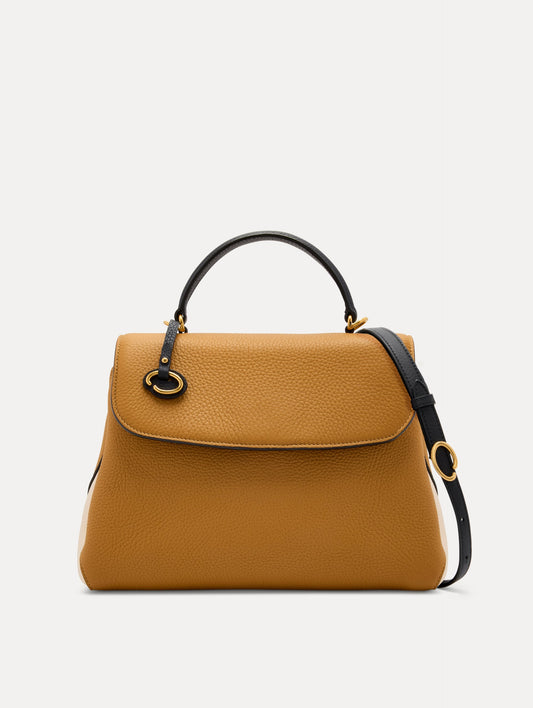 The Poppy Handbag in Honey with Black Top Handle and removeable shoulder strap. Adorned with Oscar de la Renta's signature O at the ornamental bag tag. Front View