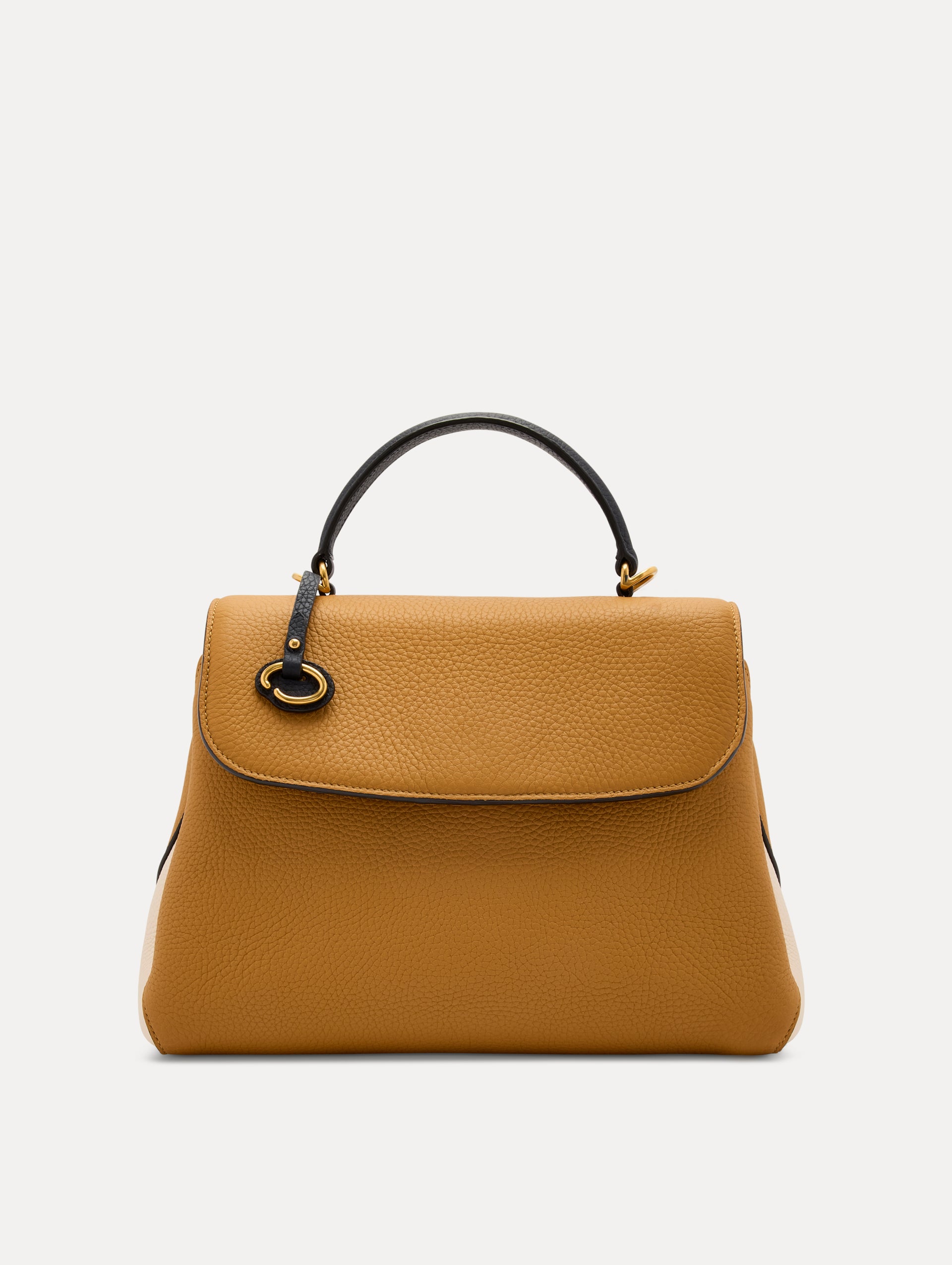 The Poppy Handbag in Honey with Black Top Handle. Adorned with Oscar de la Renta's signature O at the ornamental bag tag. Front View