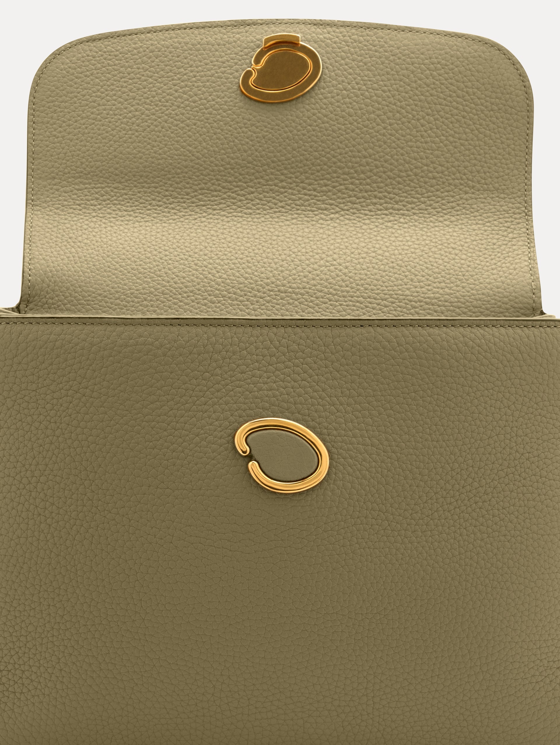 The Poppy in Sage Green, Adorned with Oscar de la Renta's signature O at a discreet magnetic closure. Zoom View