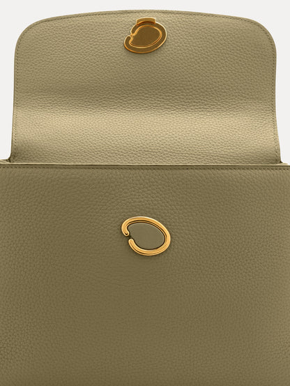 The Poppy in Sage Green, Adorned with Oscar de la Renta's signature O at a discreet magnetic closure. Zoom View