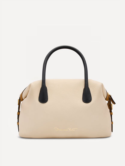 The Dahlia Handbag in Ivory with Black Top Handles. Adorned with Oscar de la Renta's signature logo in the bottom center of the back of the bag. Back View