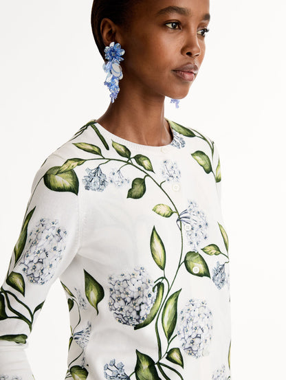 Classic ribbed-knit long sleeve cardigan with Porcelain motif.Crew neckline and banded trim. Close Up Side View.