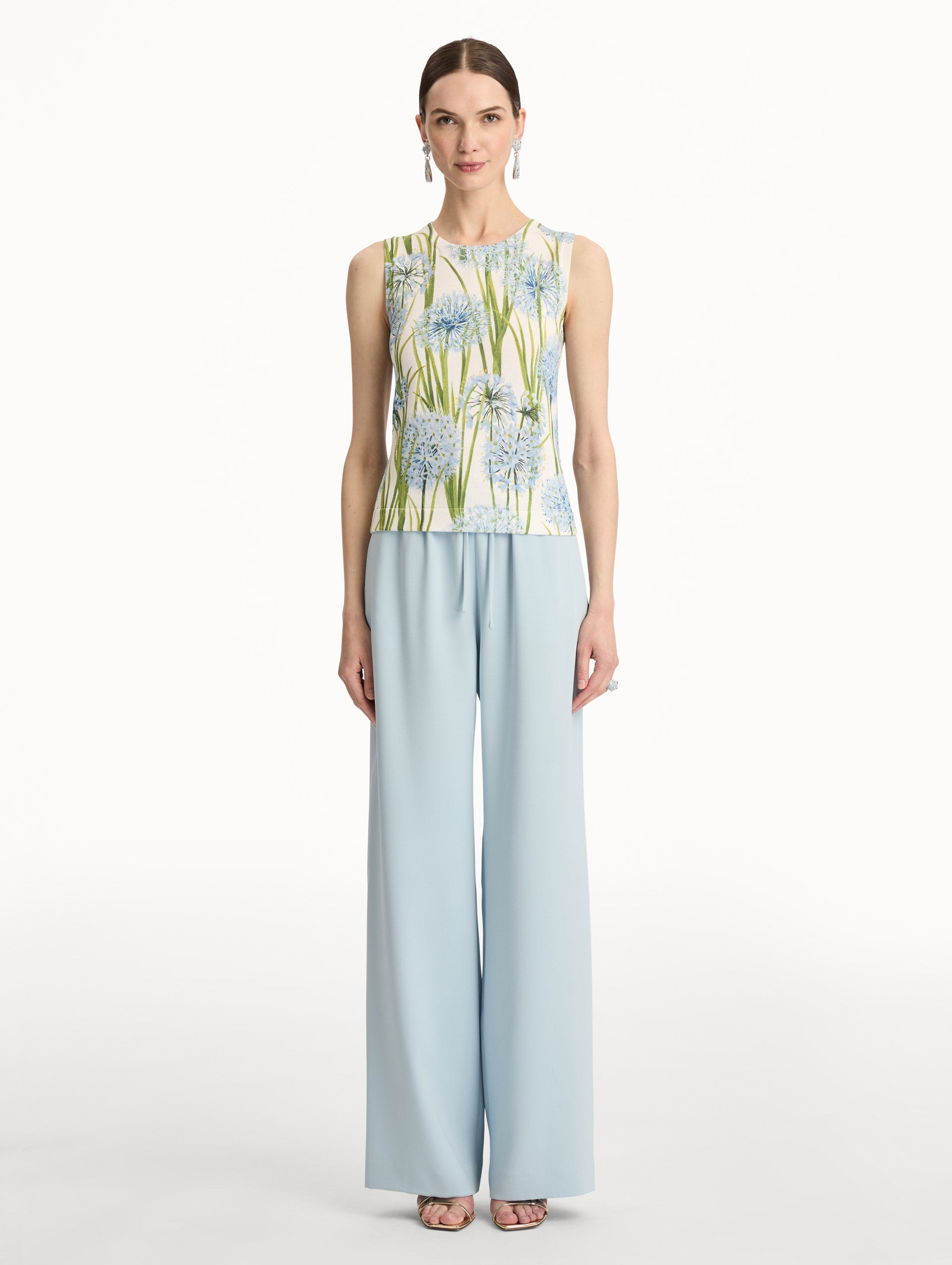 Ivory Allium Printed Tank with knit texture and blue and green floral motifs. Front View.