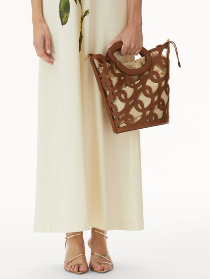 Cognac Oscar Chain-Link Leather Tote, formed by interlocking 'O' emblems and a large 'O' forms the top handle, with a removable interior pouch. Front View