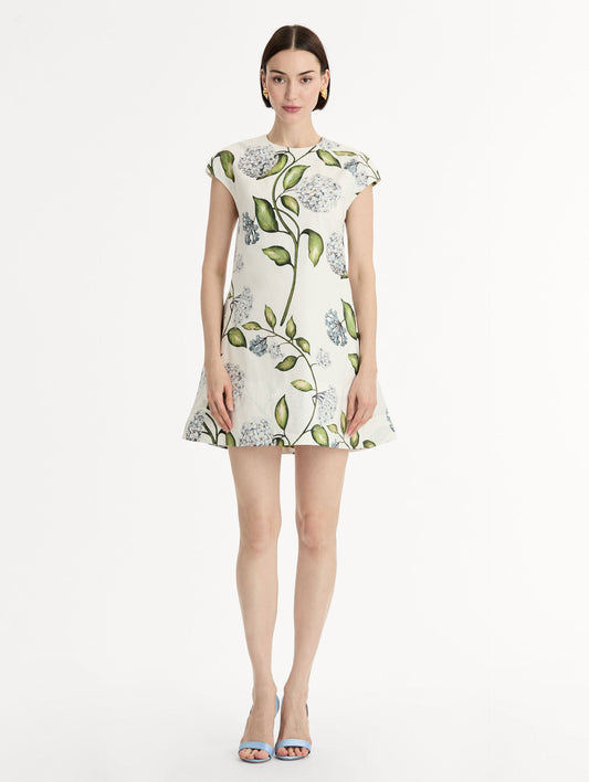 Porcelain Flower Cotton Poplin A-Line Mini Dress. Short Sleeves. Blue and Green Floral Motif. Front View.