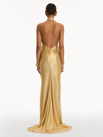 Gold Bugle Bead Lamé Gown with halter neck and key hole. Back View.