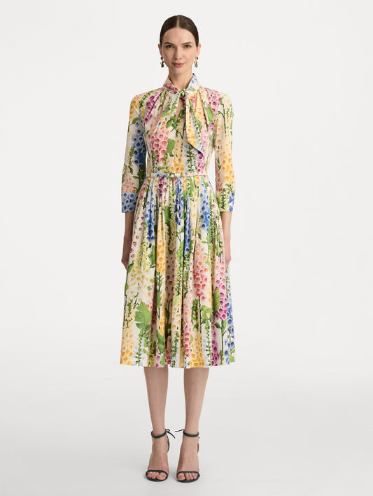 White Foxglove Cotton Poplin Tie-Neck Dress with belted waist and three-quarter length sleeves. Front View.