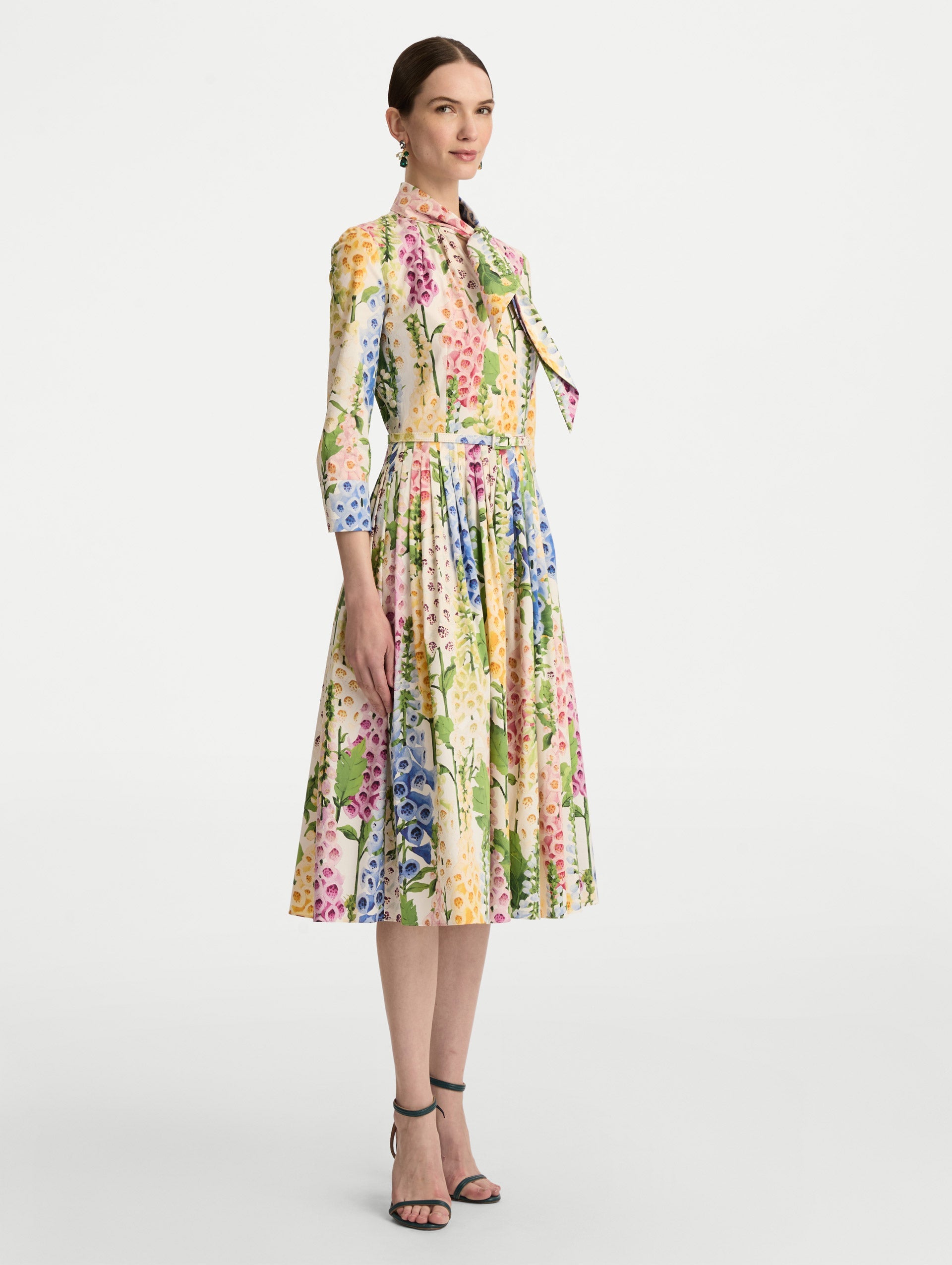 White Foxglove Cotton Poplin Tie-Neck Dress with belted waist and three-quarter length sleeves. Side View.