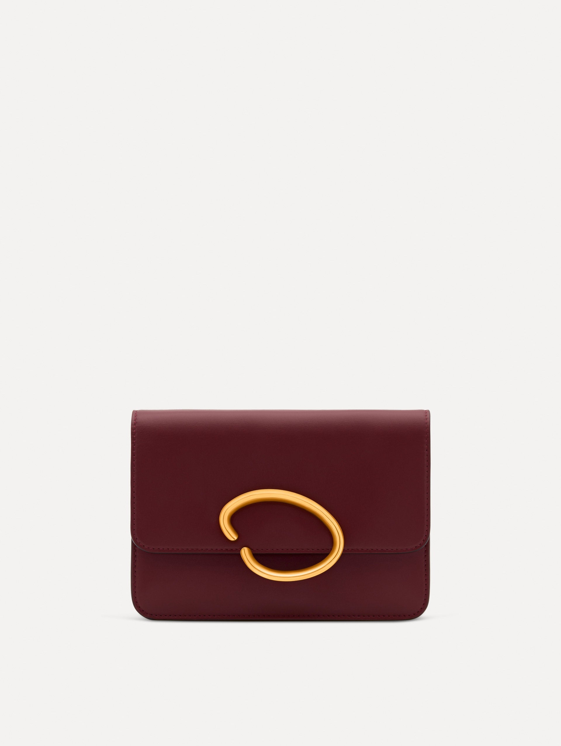 Maroon O Pochette with gold hardware and abstract O Clasp. Front View.