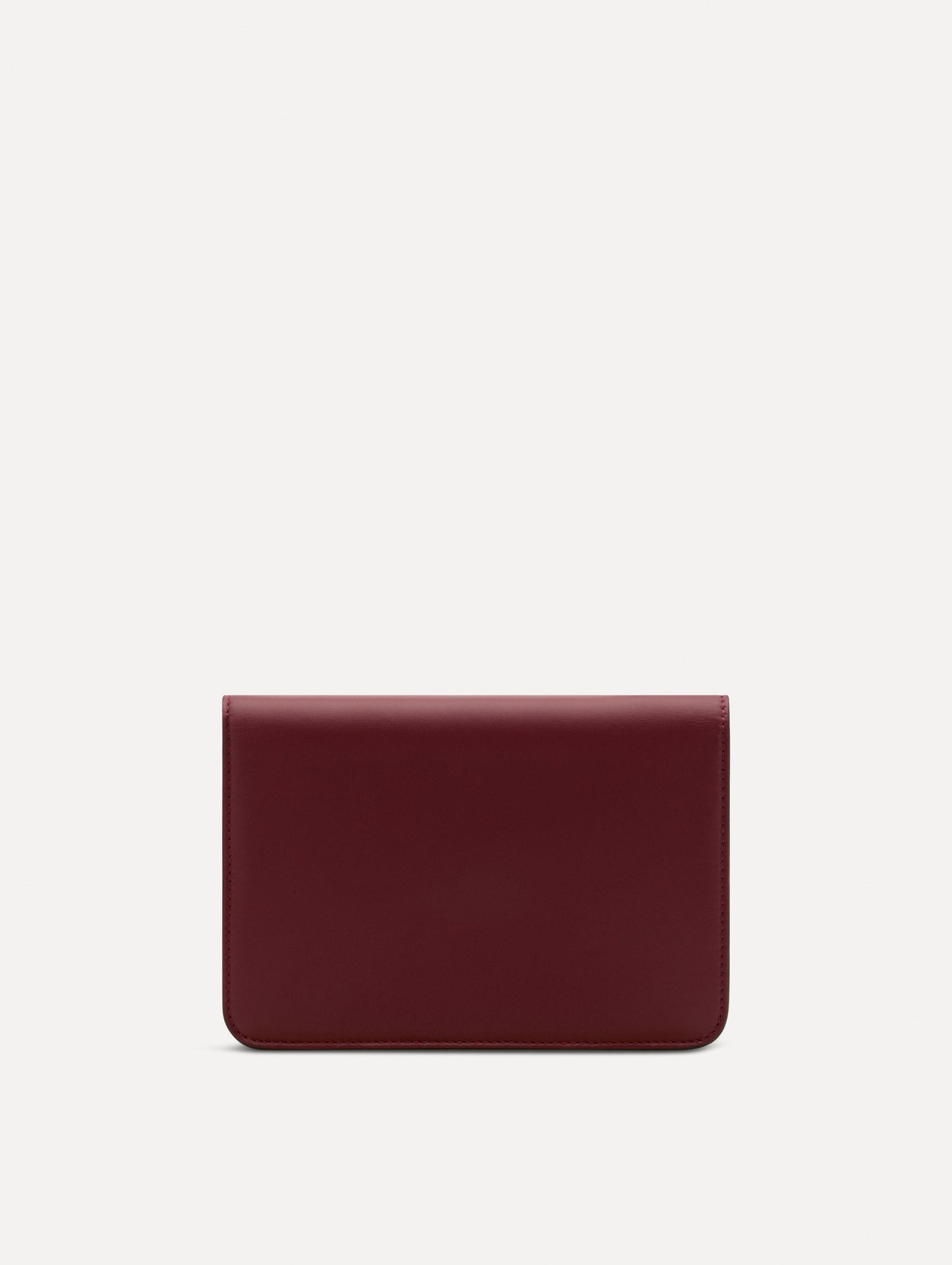 Maroon O Pochette with gold hardware and abstract O Clasp. Back View.