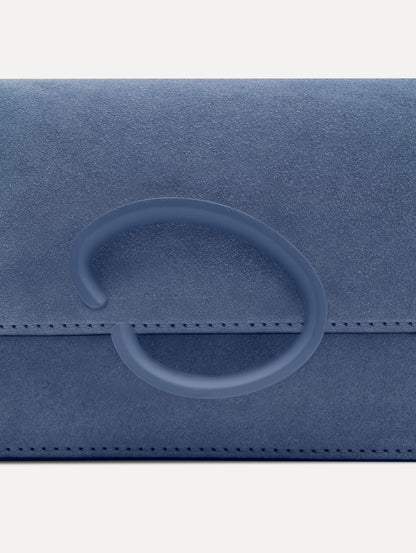 Blue O Pochette in Suede with gold strap and blue abstract O Clasp. Zoom View.