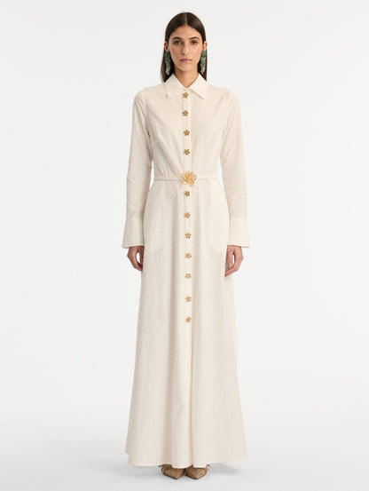 Ivory Oscar Chain-Link Cotton Poplin Caftan featuring a collared neckline, flared sleeves, gold button front, and belted waist with floral buckle. Front View.