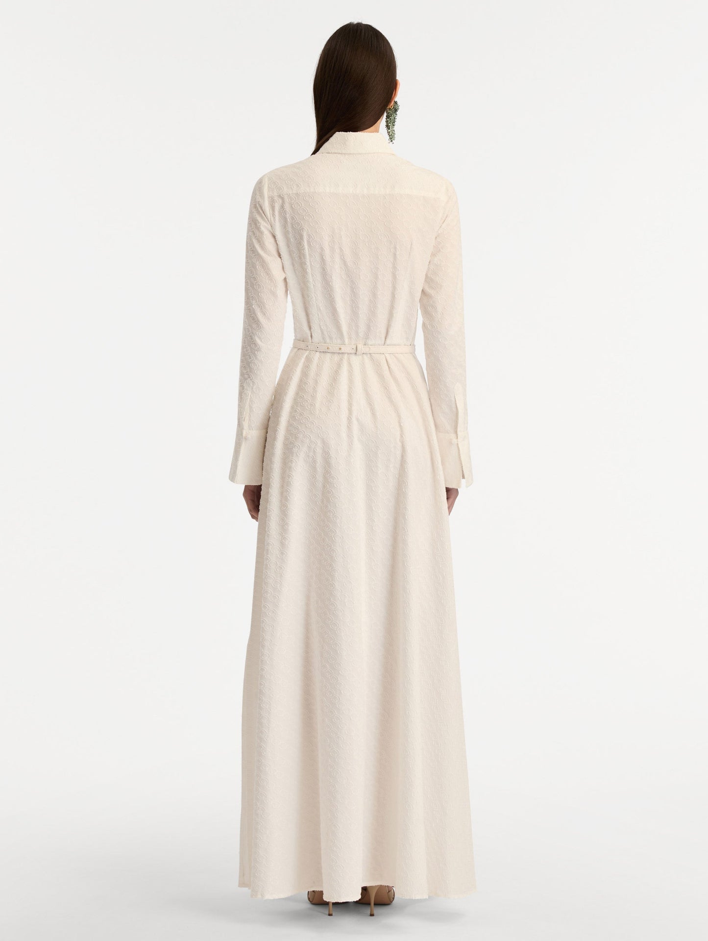 Ivory Oscar Chain-Link Cotton Poplin Caftan featuring a collared neckline, flared sleeves, gold button front, and belted waist with floral buckle. Back View.