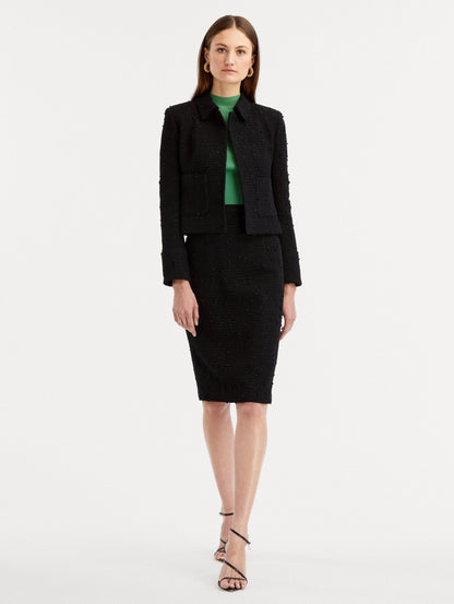 Black Boucle Tweed Jacket Styled with Tweed Black Skirt and Green Top Under Front View