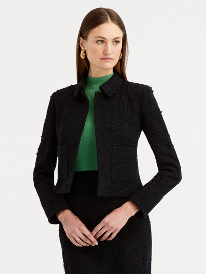 Black Boucle Tweed Jacket Styled with Tweed Black Skirt and Green Top Under Front View