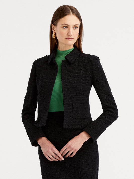 Black Boucle Tweed Jacket Styled with Tweed Black Skirt and Green Top Under Front View